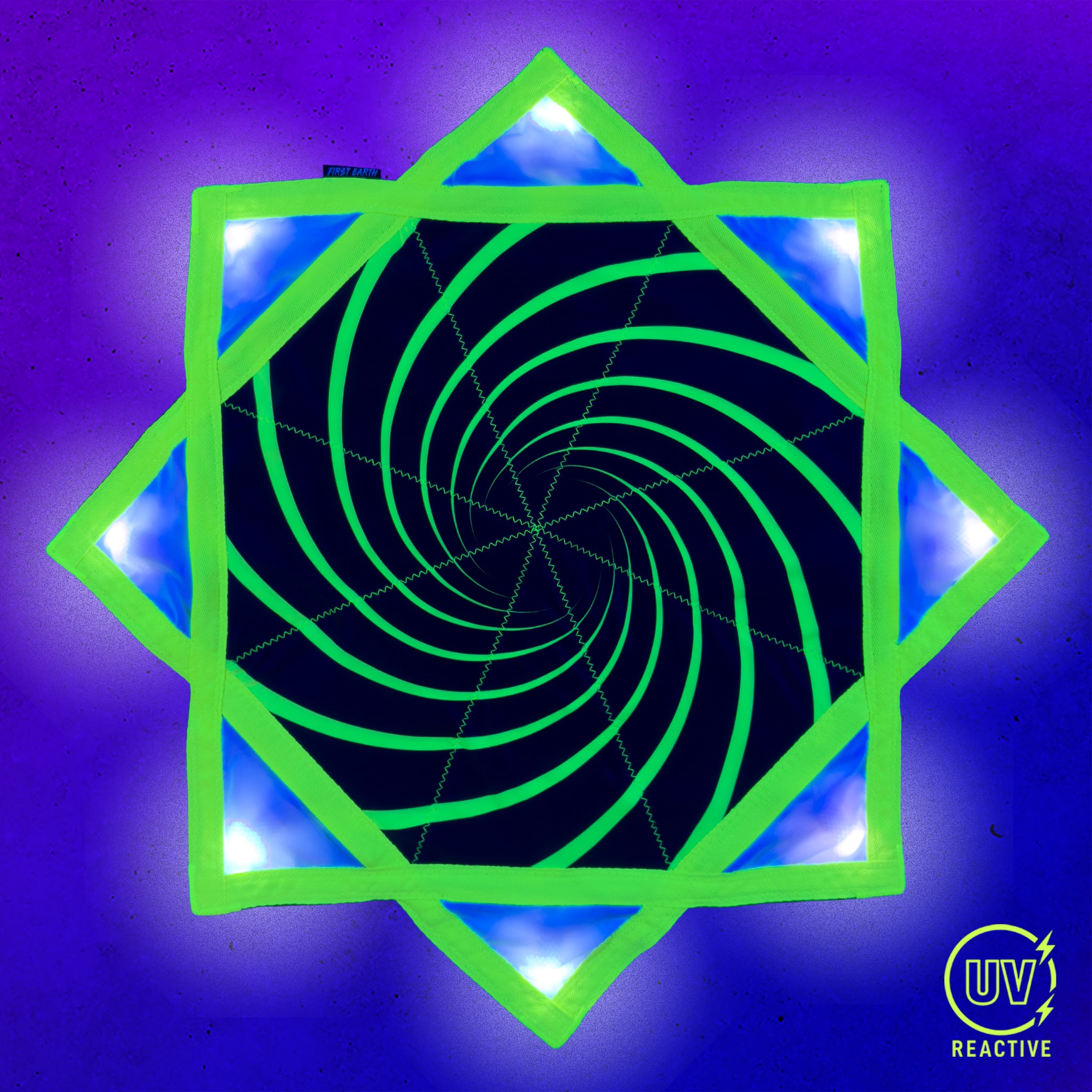 Spiral 6 - LED Flow Star by First Earth, nighttime view showing the bright LED pattern and complete Flow Star design