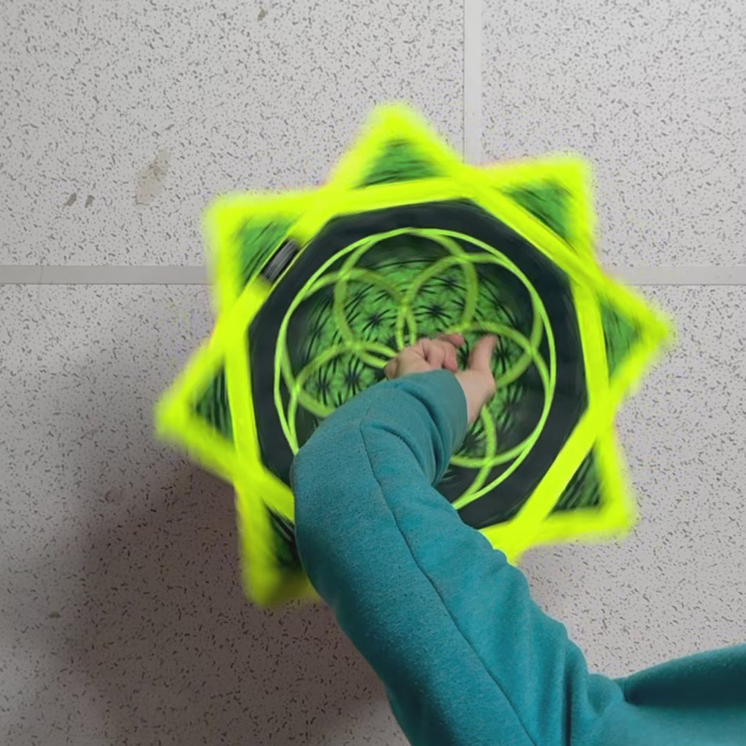 Mini Flower of Life – UV spinning flow star by First Earth, compact rave prop with sacred geometry 