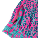Neon Cheetah UV rave shorts with bold animal print that glows under blacklight for festivals