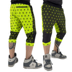 First Earth Asanoha Yellow three-quarter velvet harem shorts on model, showing front and back views with yellow geometric pattern