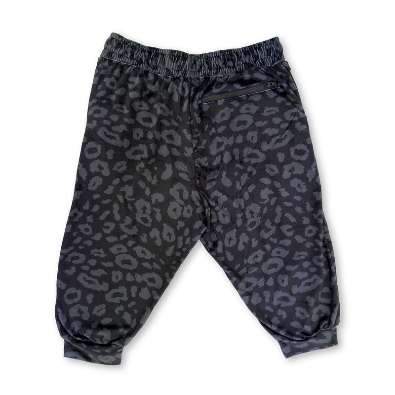First Earth Midnight Cheetah velvet 3/4 jogger shorts back with dark cheetah print and zipper pocket