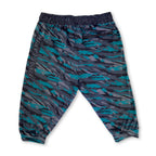 First Earth Shadow velvet 3/4 jogger shorts back with teal gray artwork, logo, and zipper pocket