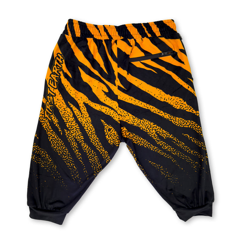 First Earth Sacred Stripes UV velvet 3/4 jogger shorts back with orange and black stripe print and back zipper pocket