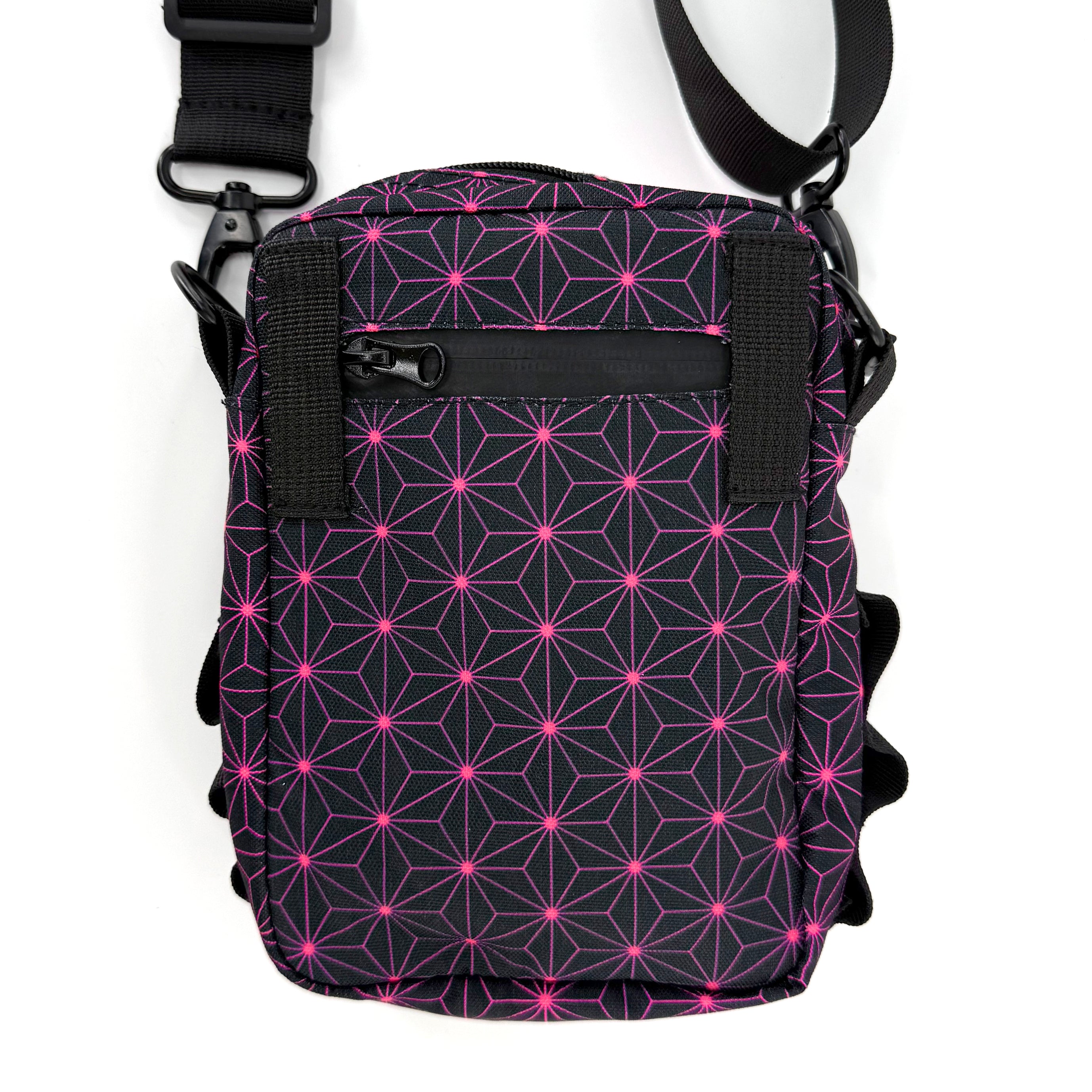 Asanoha pink sling bag by First Earth – lightweight rave bag with glowing sacred geometry print, built for spirited spinning and festivals 