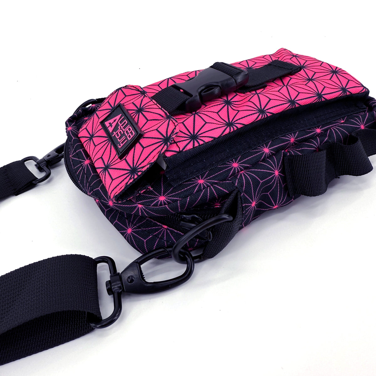 Asanoha Pink UV sling bag under blacklight