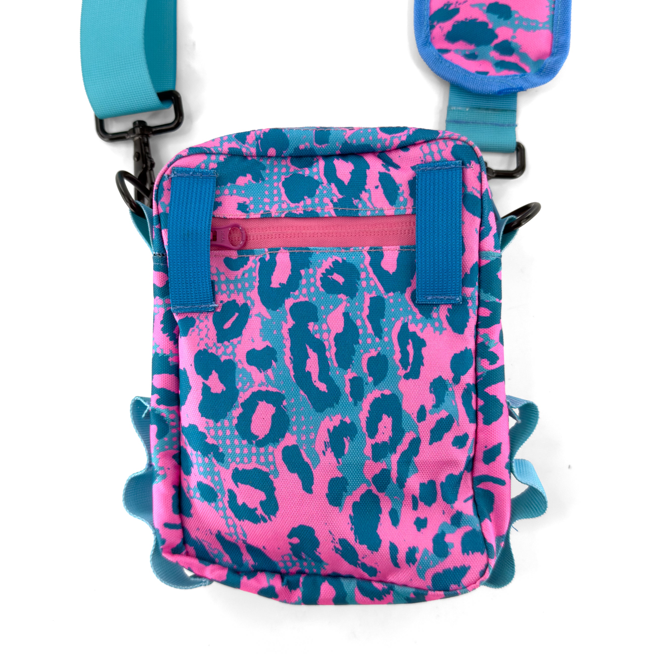 First Earth Asanoha Pink Sling Bag — UV-reactive sacred-geometry rave bag built for hands-free spinning and flow.