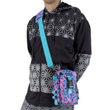 First Earth Asanoha Pink Sling Bag — UV-reactive sacred-geometry rave bag built for hands-free spinning and flow.