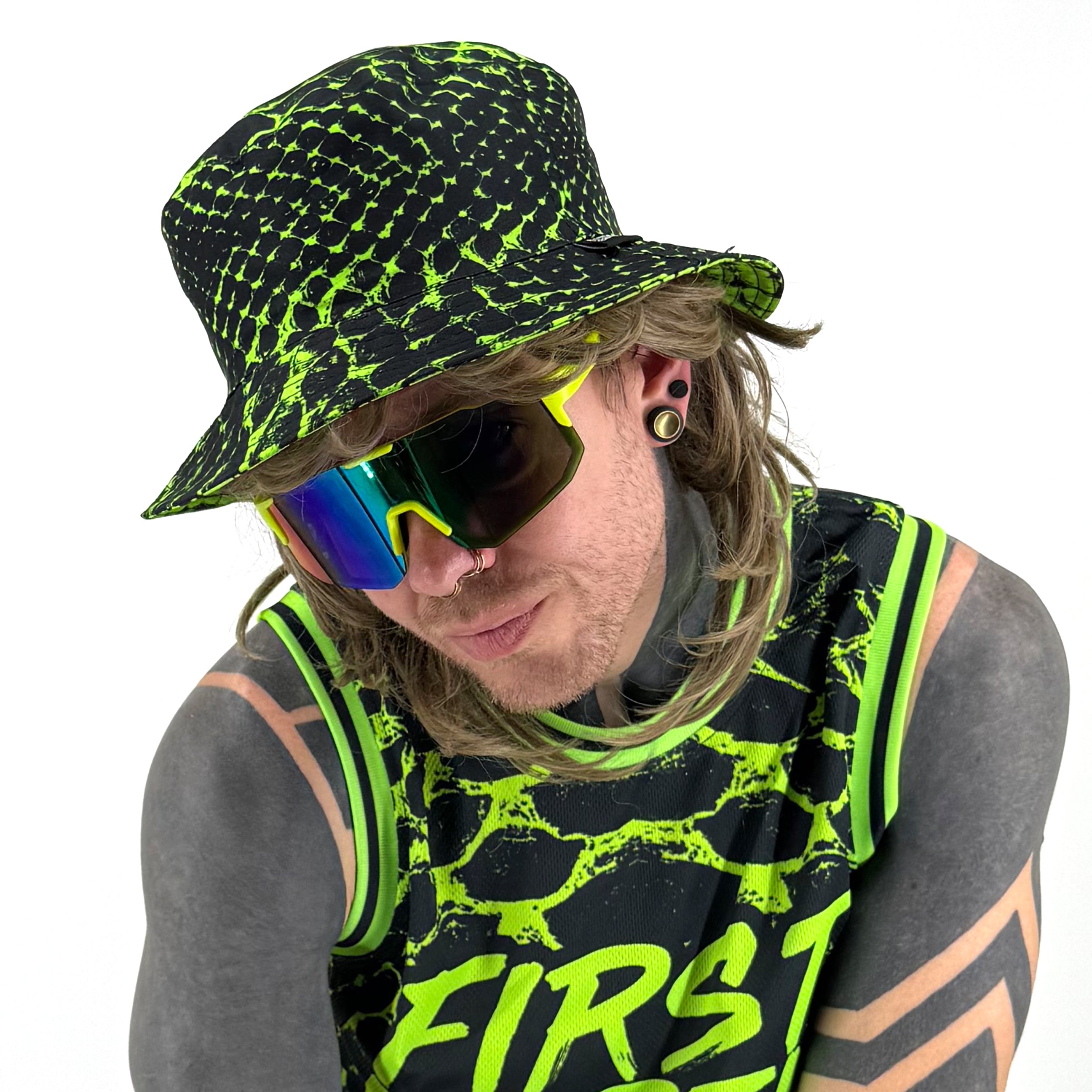 Neon Serpent UV bucket hat by First Earth – reversible rave hat with glowing serpent design on both sides, lightweight and breathable for sun-safe festival flow 