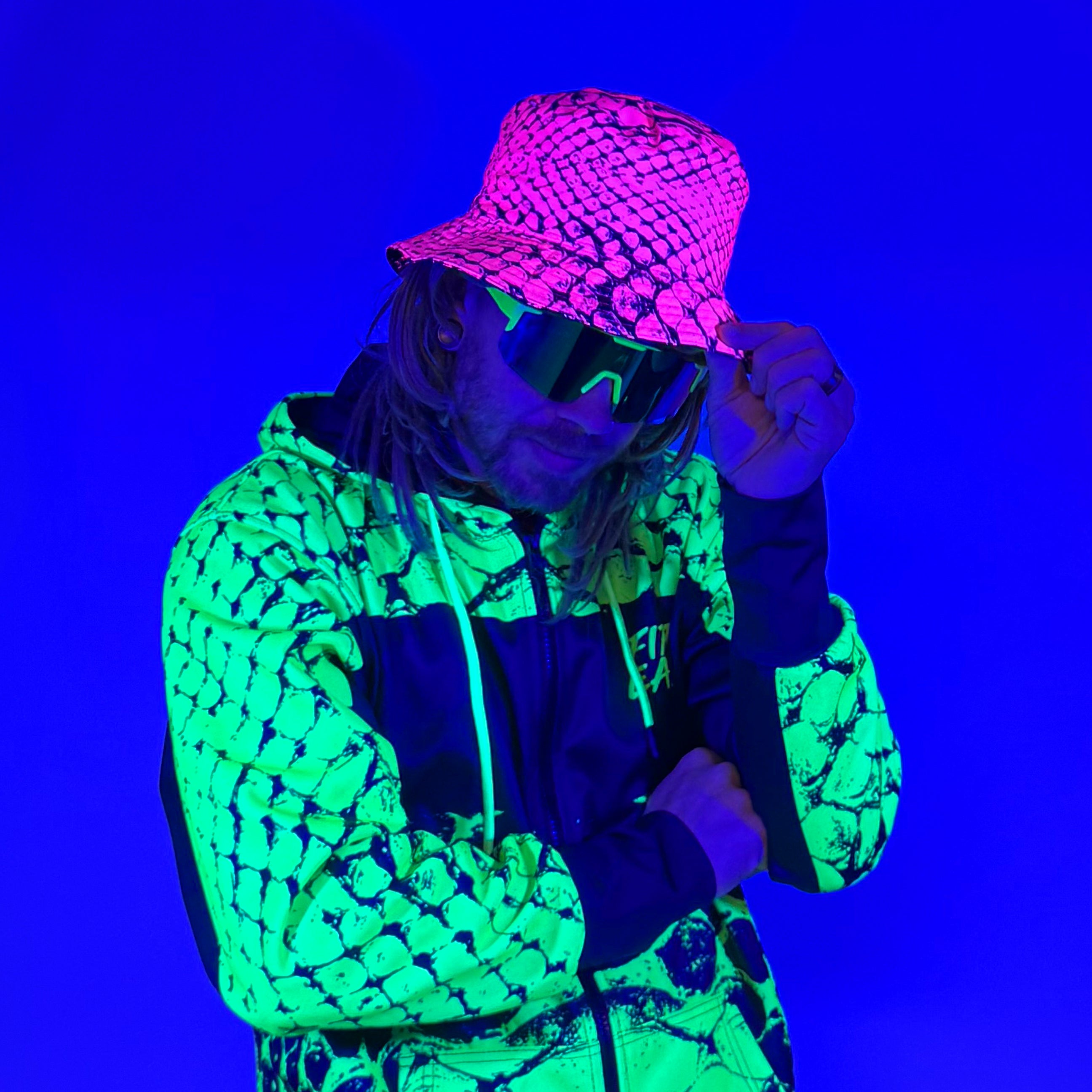 Neon Serpent Pink UV Bucket Hat by First Earth – reversible UV reactive hat for rave fashion and festivals