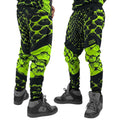 Neon Serpent UV joggers by First Earth – rave-worthy pants with glowing serpent design under blacklight, breathable soft polyester, zip pockets, and elastic drawstring waistband 