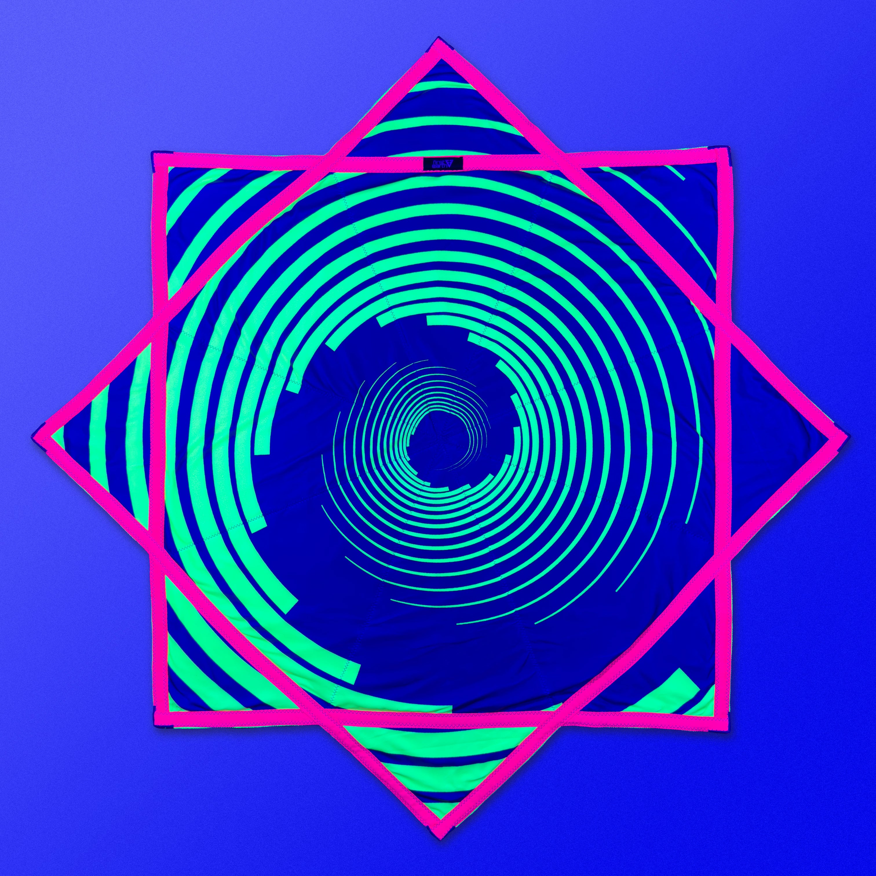 First Earth Spiral 1 48” Mega Kaiju Flow Star — color-switch UV rave prop built for huge, smooth spinning.