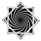 First Earth Spiral 2 UV Flow Star — black and white UV swirl rave prop made for smooth, balanced spinning.