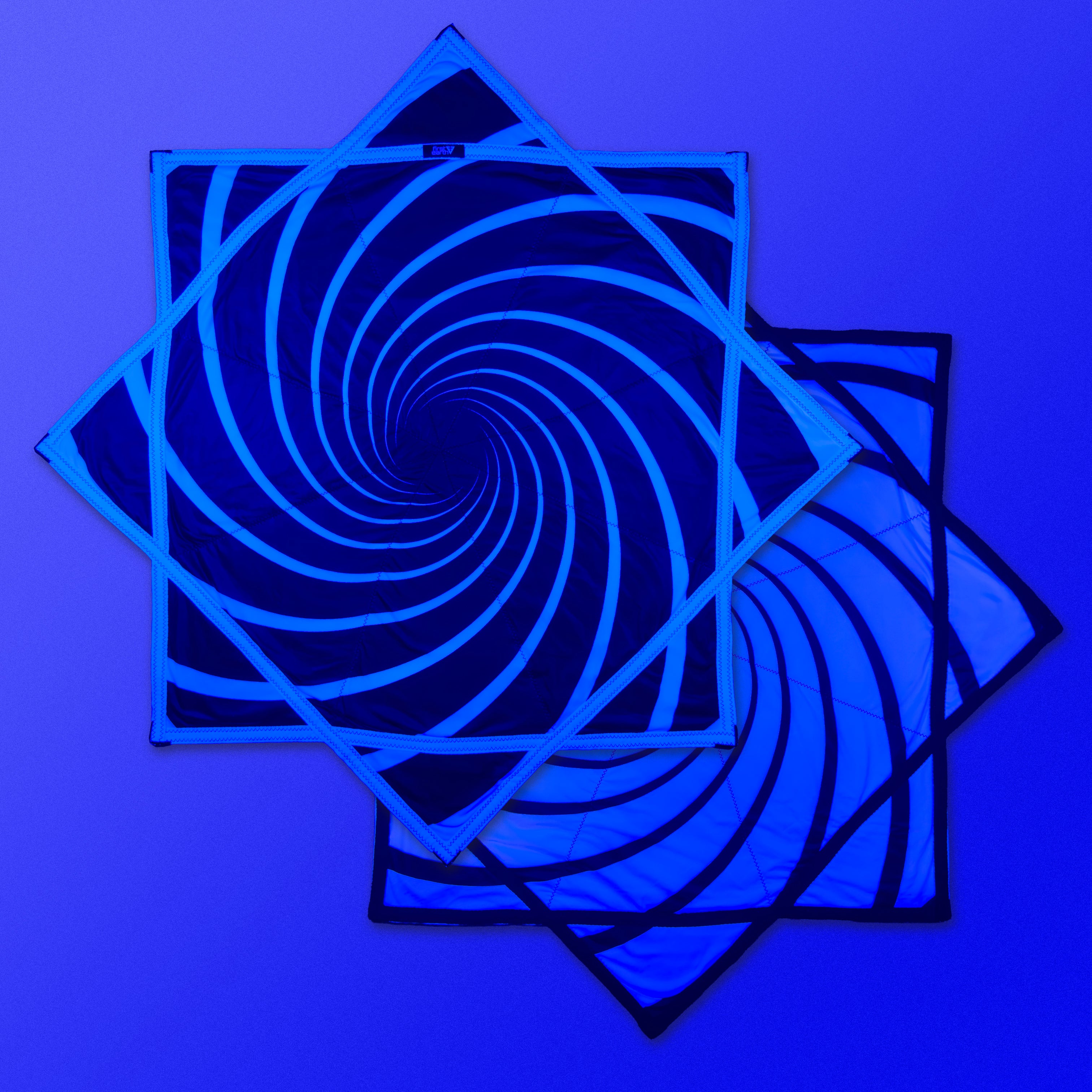 First Earth Spiral 2 48” Mega Kaiju Flow Star — black and white color-switch UV rave prop built for massive, smooth spinning.