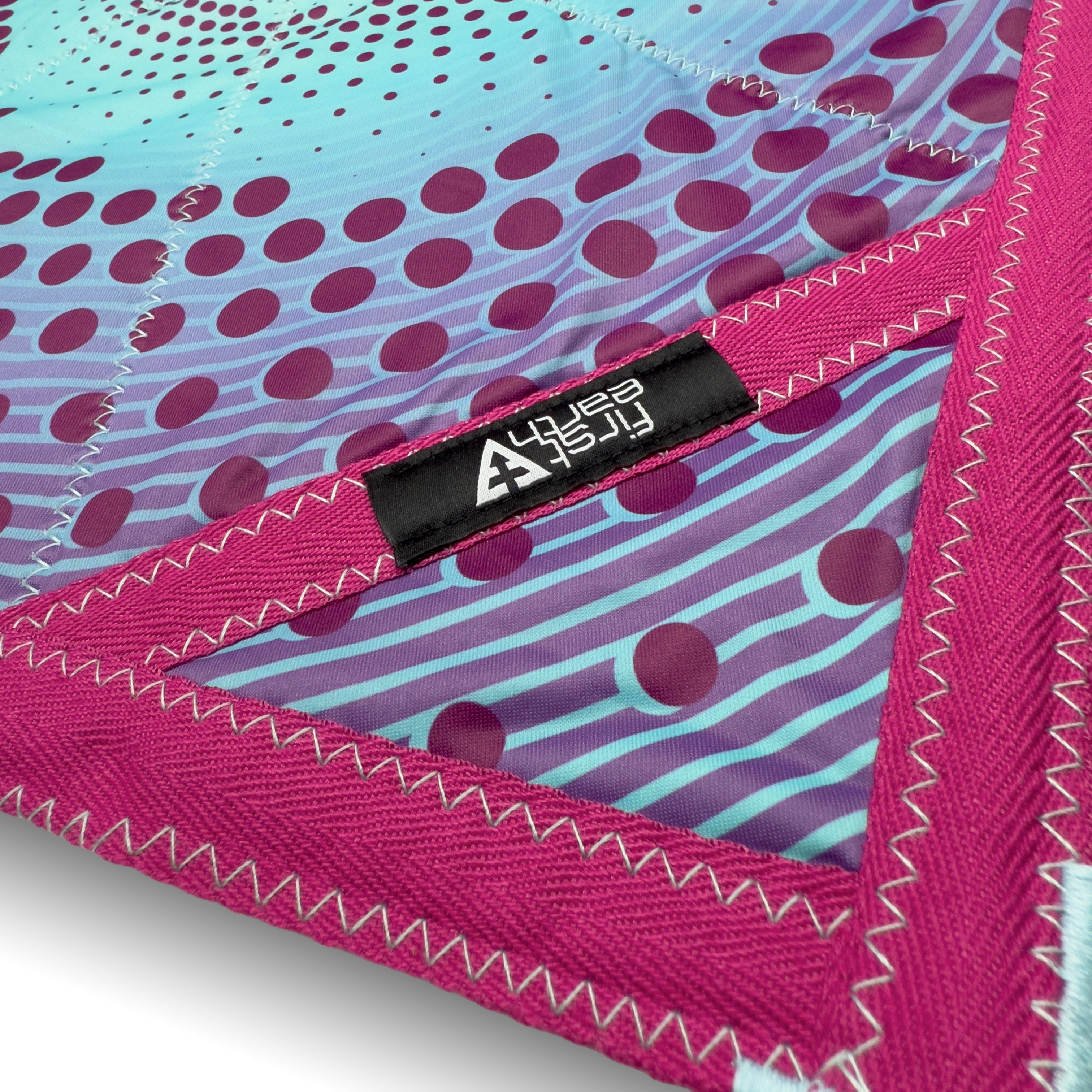 First Earth Spiral 5 Flow Star spinning under UV light — rave and festival flow prop with glowing spiral design.