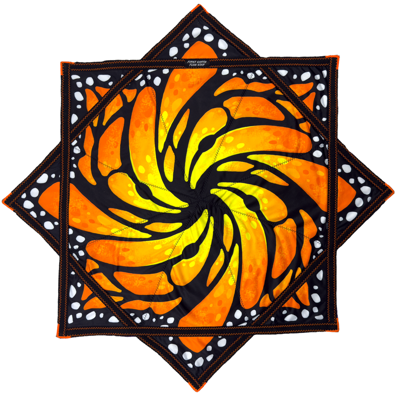 Gold and orange side of the double sided Liquid Butterfly Juice 36 inch Mega Flow Star by First Earth, spinning