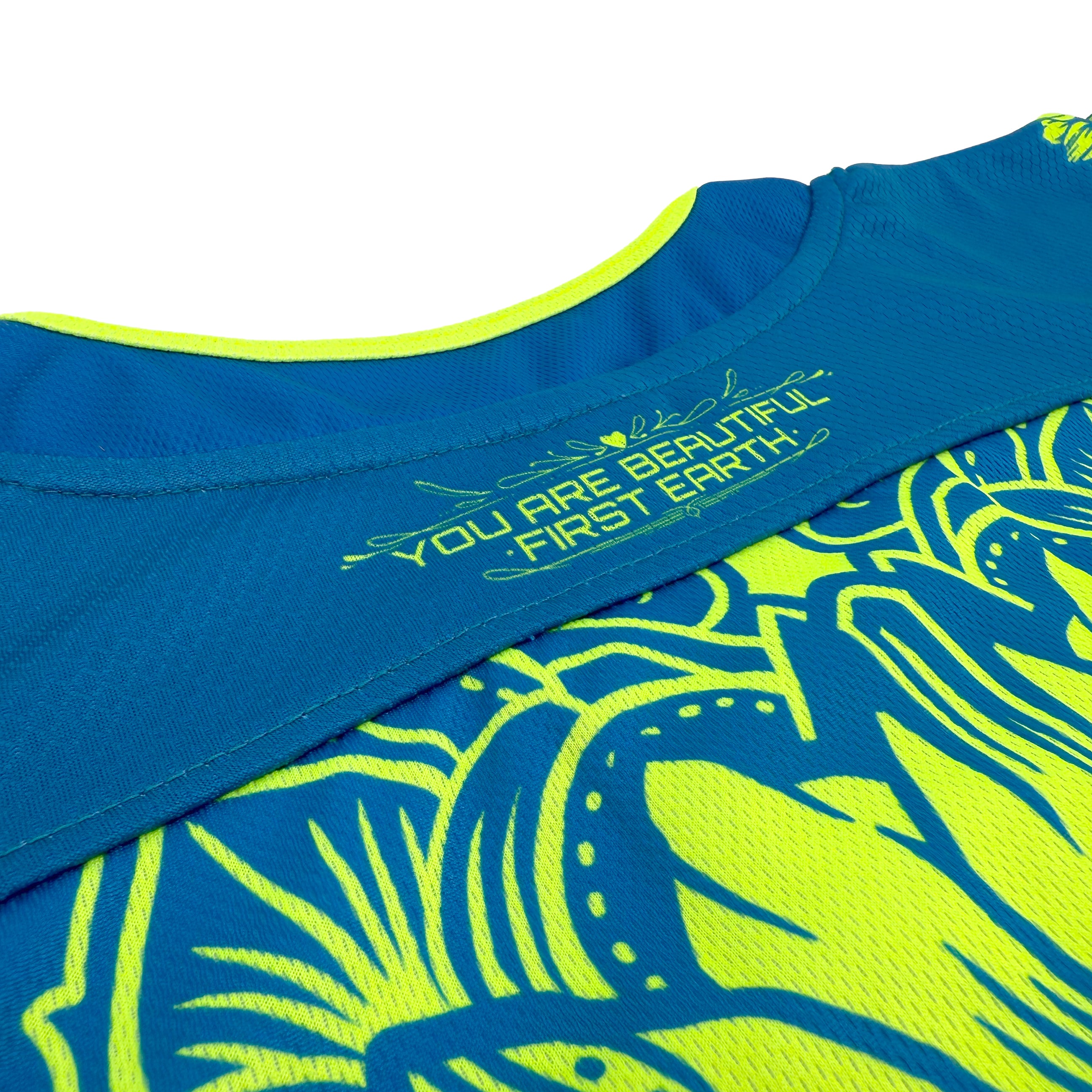 Sunflower of Life UV hockey jersey by First Earth – oversized rave-ready jersey with full UV-reactive print that glows under blacklight