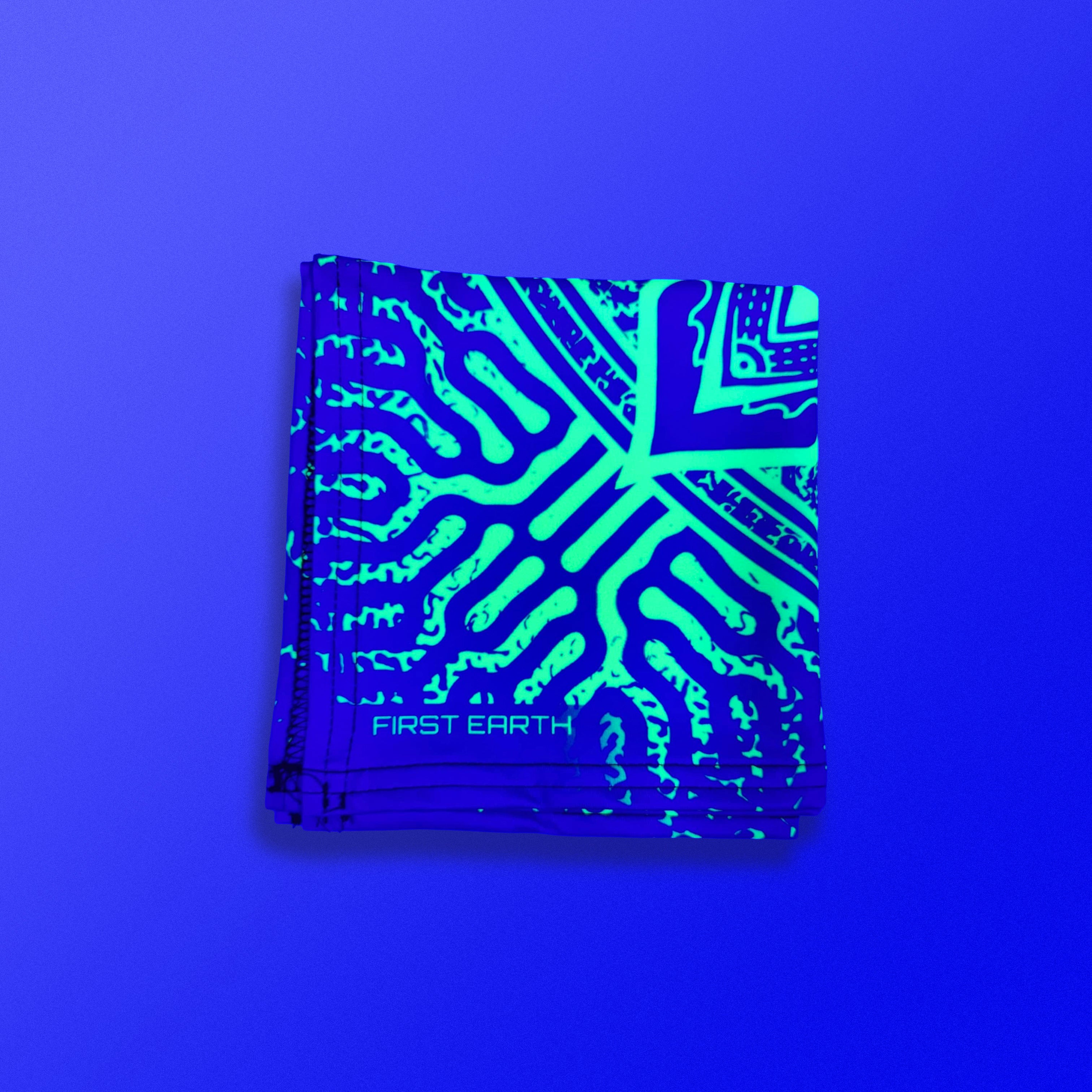 Sunflower UV glow bandana by First Earth – lightweight rave accessory with glowing floral design under blacklight, breathable and bold 