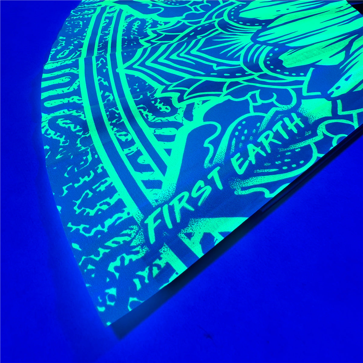 Sunflower UV hand fan under blacklight