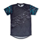 First Earth Shadow mesh t-shirt front with dark geometric pattern and teal sleeve accents