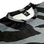First Earth Sacred Stripes velvet t-shirt close up showing collar, tag, and soft fabric