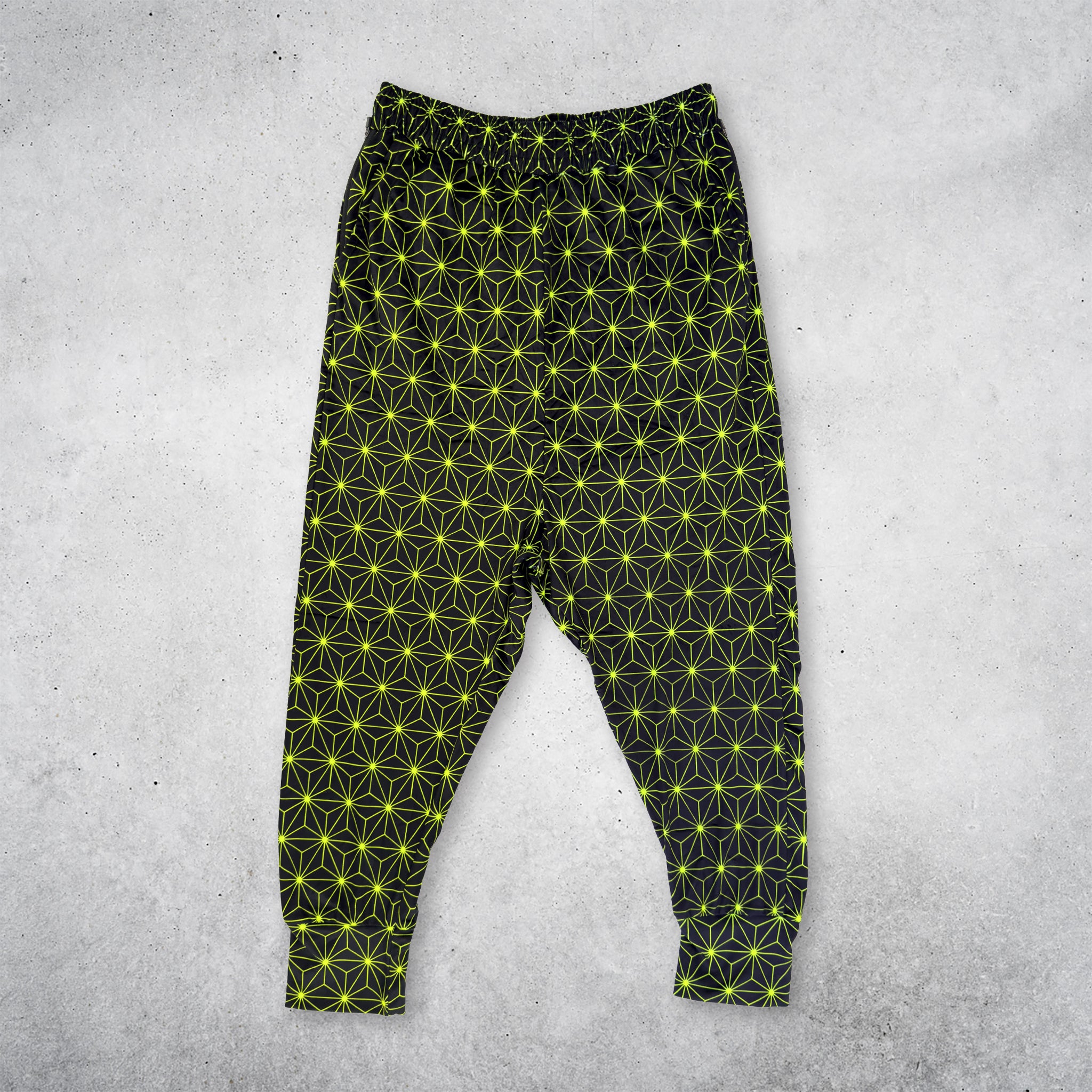 First Earth Asanoha Yellow UV velvet harem joggers front with neon yellow asanoha pattern on black velvet