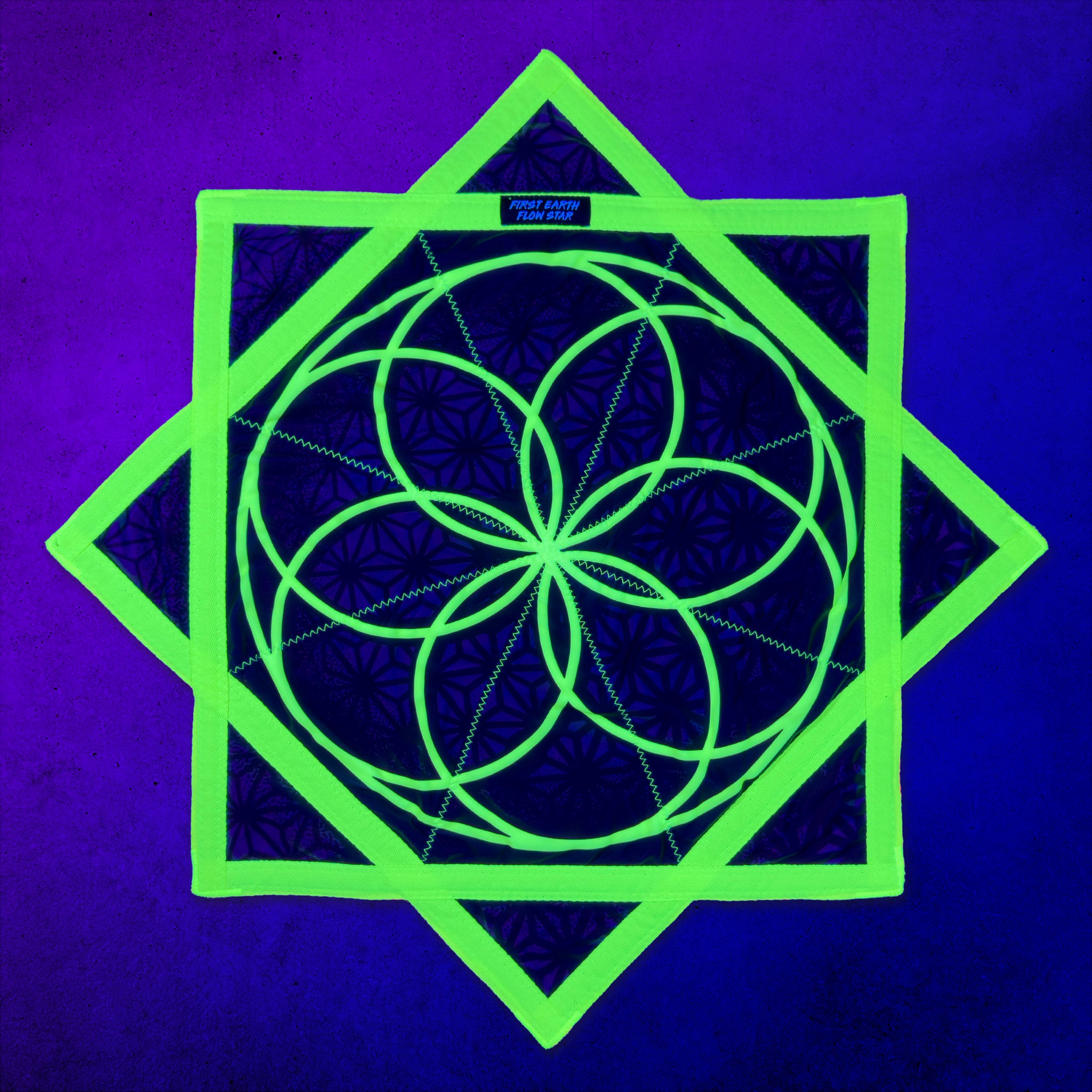 First Earth Flower of Life Midnight flow star glowing green under UV blacklight