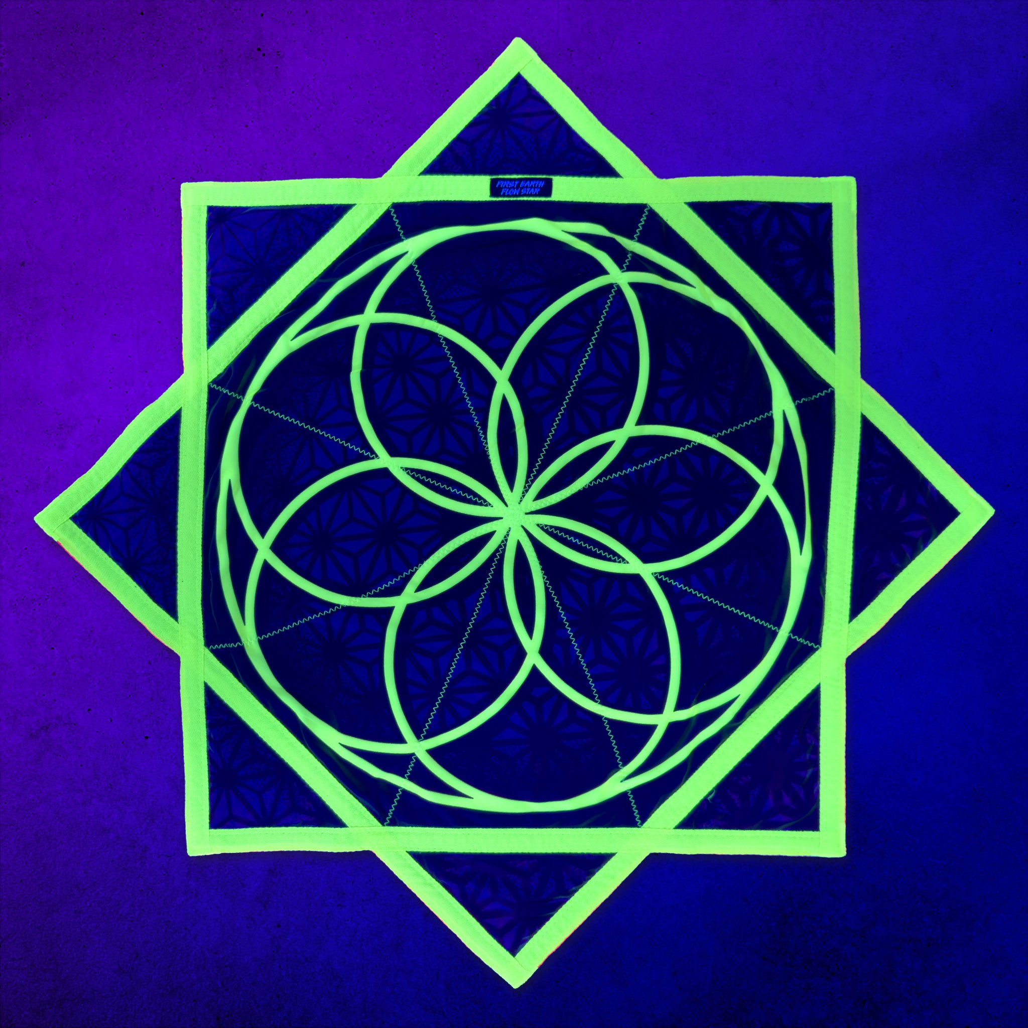 Flower of Life Midnight 36 inch UV flow star glowing green under blacklight by First Earth