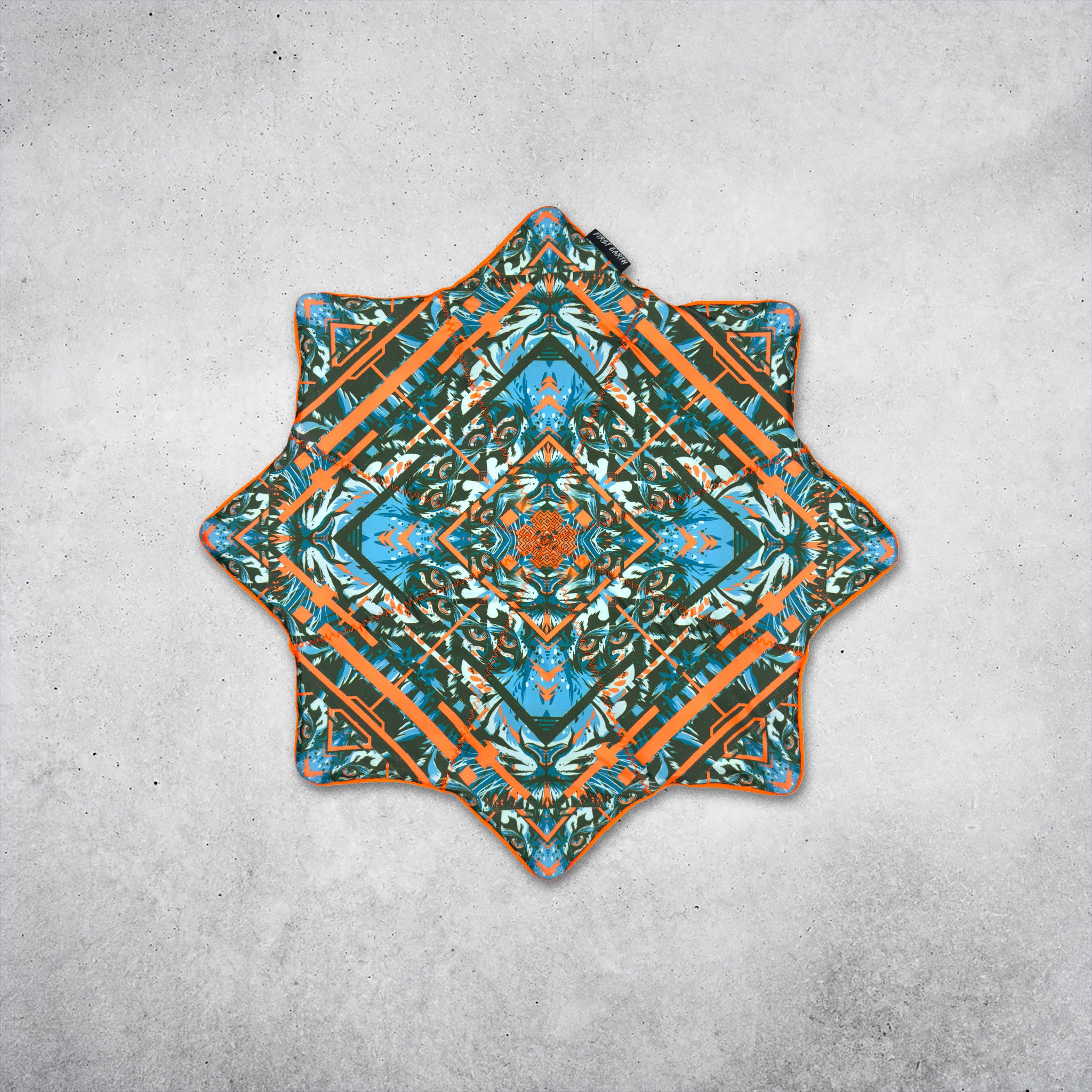Glitch Tiger Orange 20 inch UV Flow Star by First Earth spinning, front side