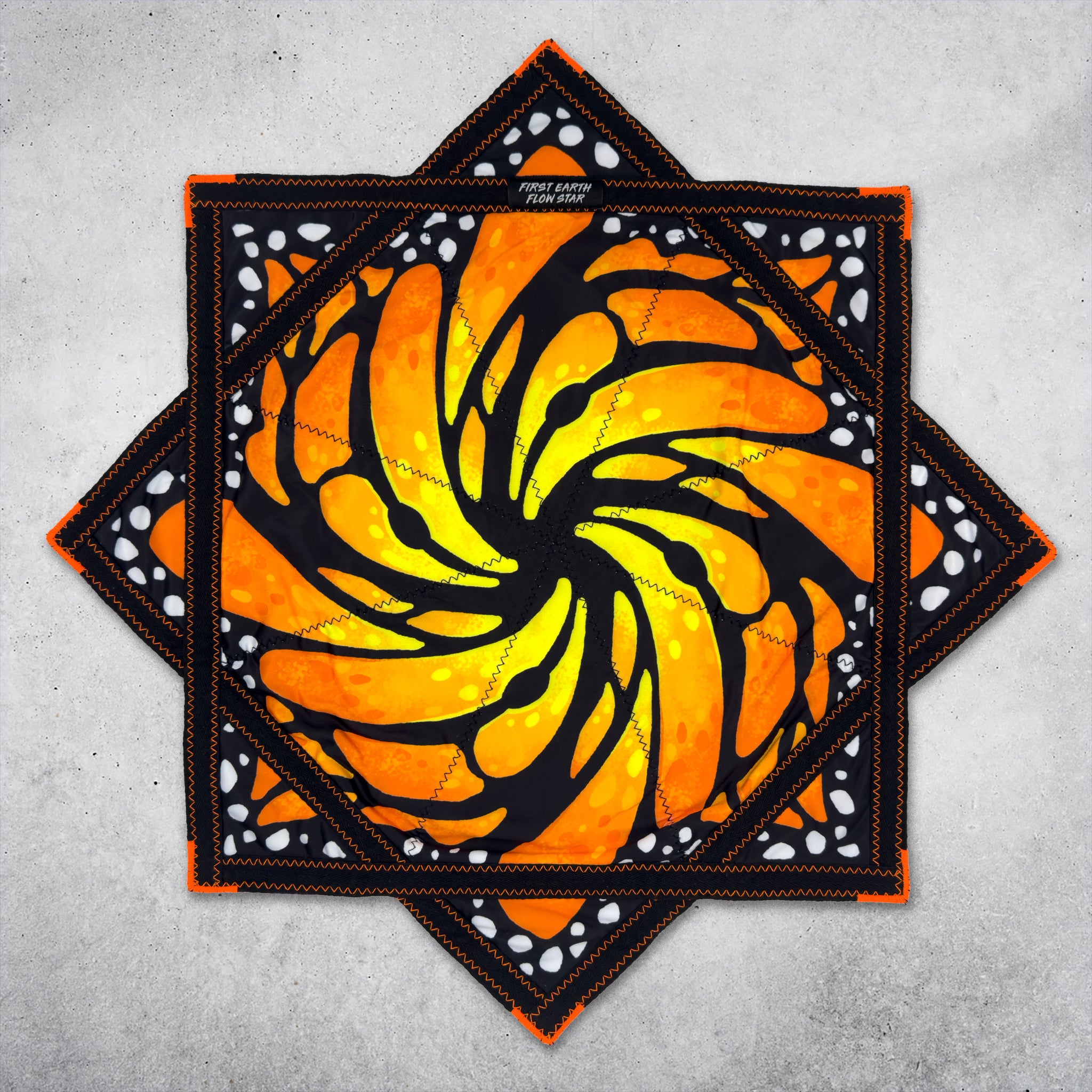 Liquid Butterfly Juice regular UV flow star front with orange butterfly swirl by First Earth