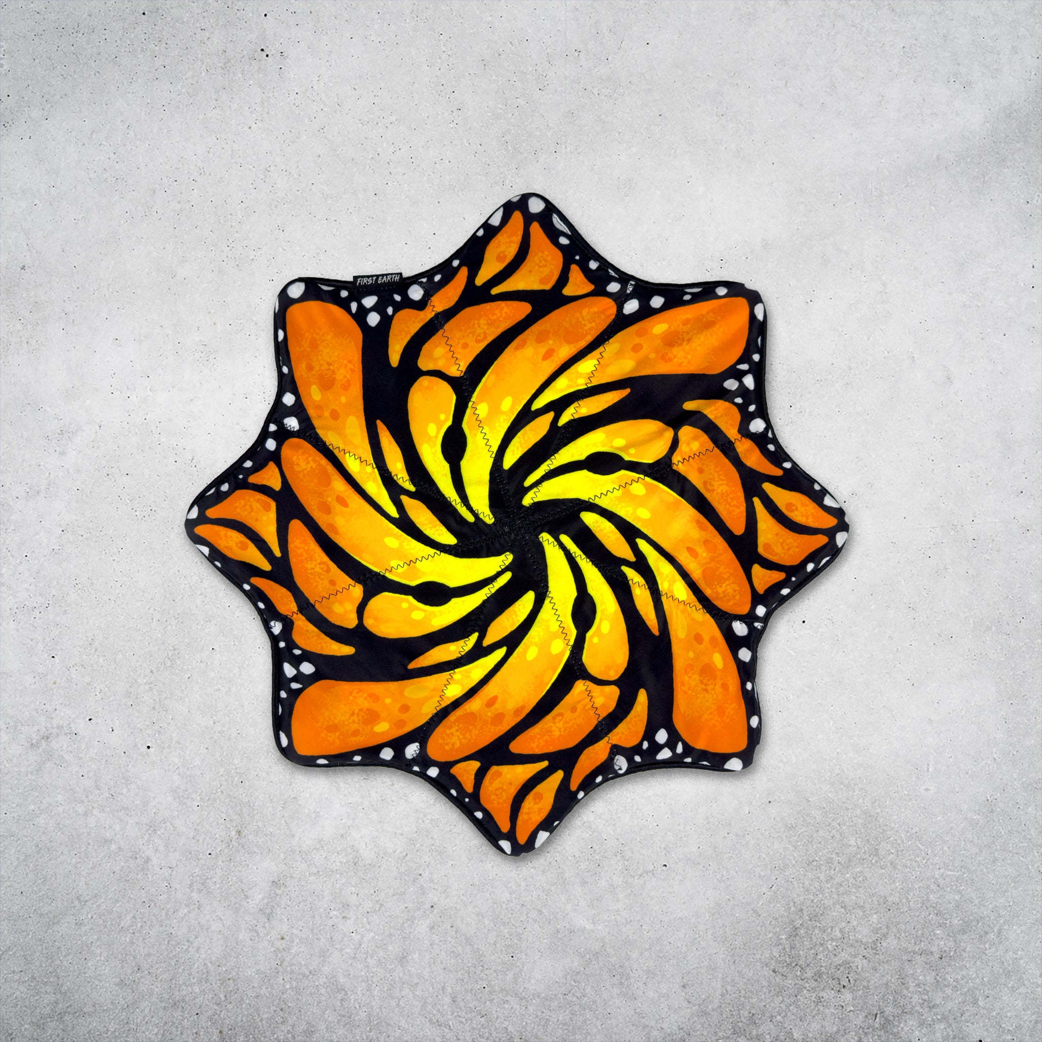 Liquid Butterfly Juice 20 inch mini UV trimless flow star front by First Earth on concrete background