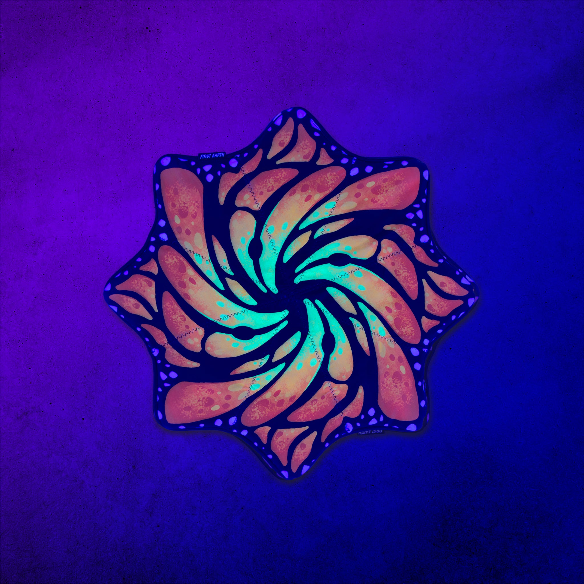 Liquid Butterfly Juice mini UV trimless flow star glowing under blacklight by First Earth for rave flow arts