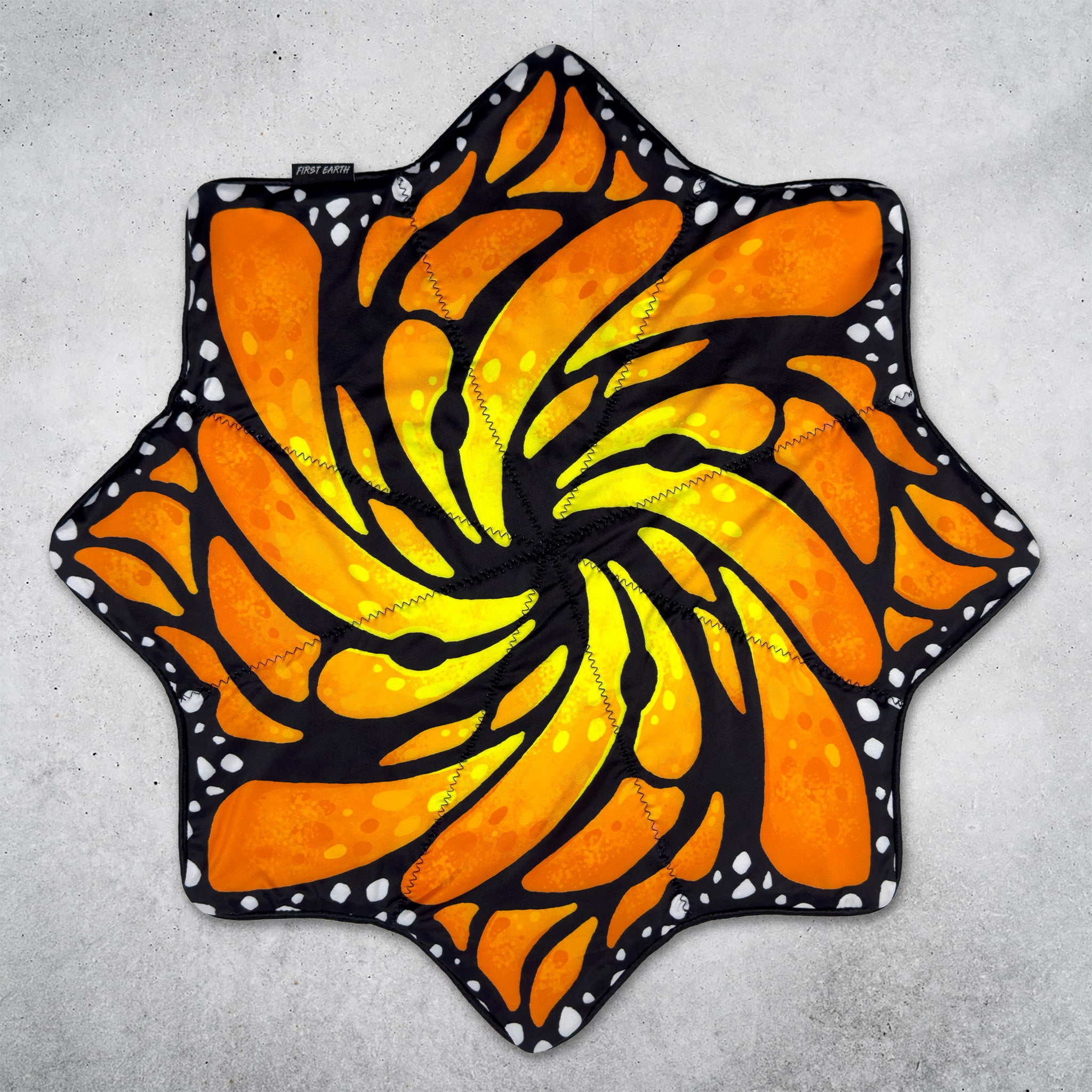 Liquid Butterfly Juice regular UV trimless flow star front by First Earth on concrete background
