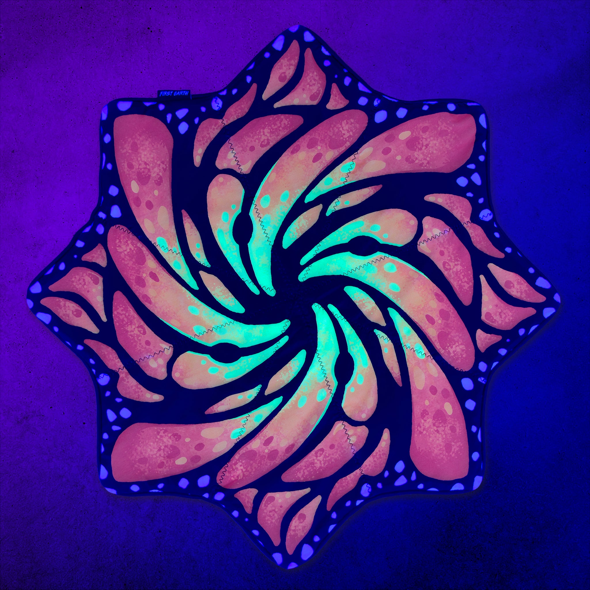 Liquid Butterfly Juice regular UV trimless flow star glowing under blacklight by First Earth