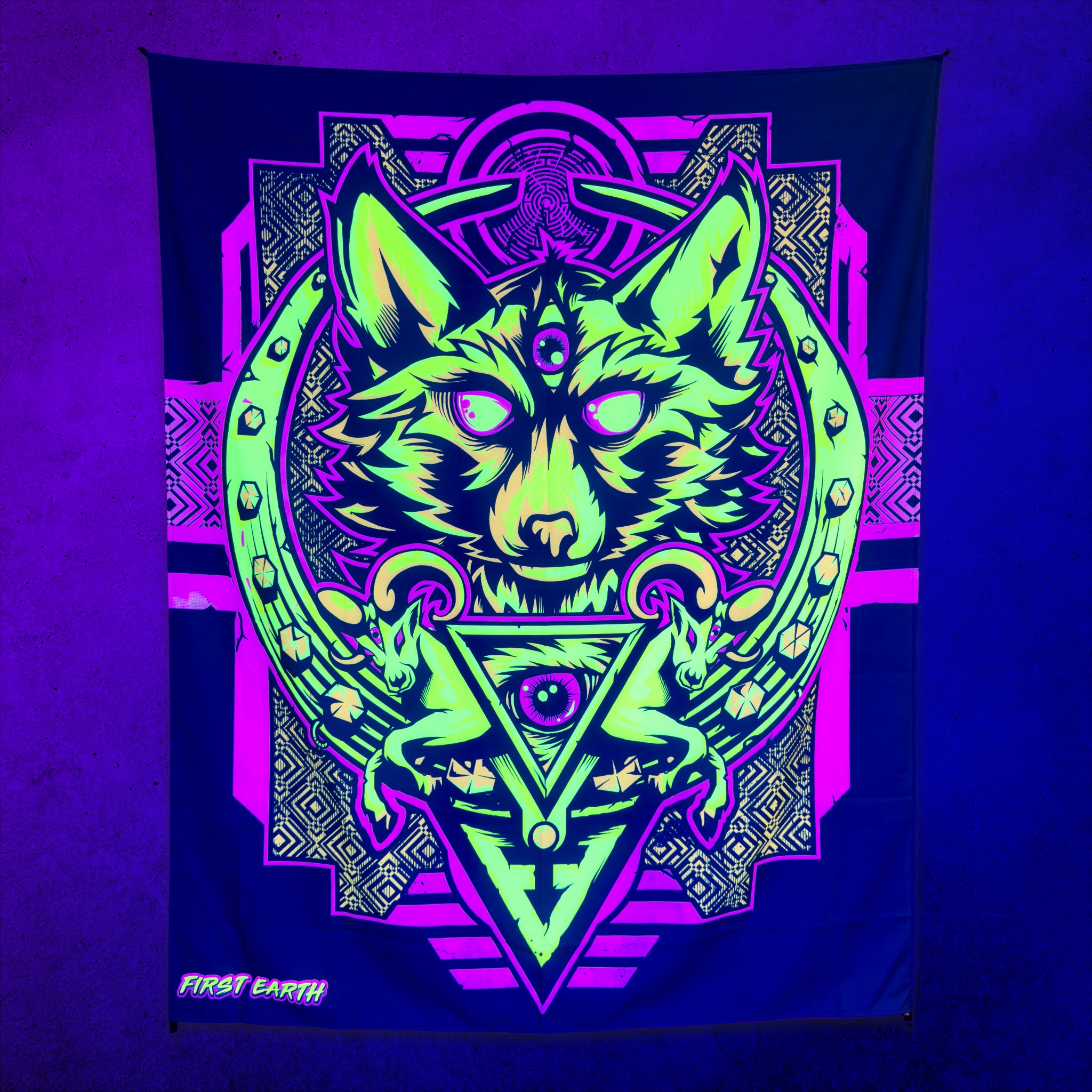 Wolf Totem UV tapestry by First Earth glowing under UV black light