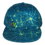 Camelot snapback hat by First Earth – attention-grabbing teal and yellow rave cap with bold pattern, 100% polyester, custom sweatband, satin liner with hidden pocket, limited-edition design 