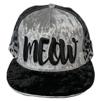 MEOW snapback hat by First Earth – luxurious velvet front panel and visor with bold leopard print, 3D embroidery, custom woven sweatband, satin liner, and hidden pocket—festival-ready flair 
